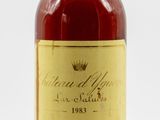 an image of a bottle of wine sitting on top of a table