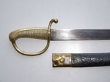 an image of a knife and a sword on a white surface