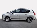a picture of a small white car parked in a parking lot