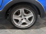 a close up of a car tire on the ground