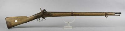 an old rifle with a wooden barrel and a wooden case