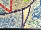 drawing of a bird on a piece of paper with colored crayons on it