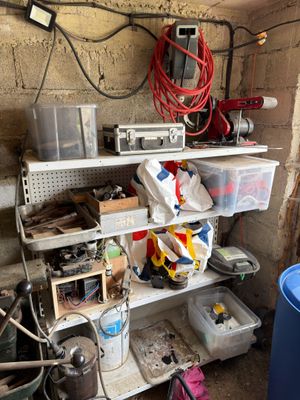 a shelf with many items on it in a room