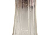 a glass vase with a bird on top of it