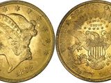 a gold coin with a woman ' s head on it
