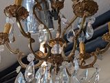 a chandelier hanging from the ceiling in a room