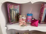 a shelf that has a lot of beauty products on it