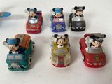 a lot of toy cars that are sitting on a table