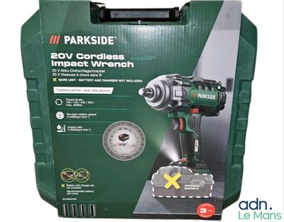 a green box with a black and white picture of a cordless drill