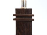 a lamp that is on top of a wooden table