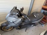 a motorcycle that is parked in a garage