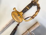 an image of a pair of swords on a white surface