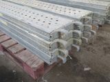 a lot of steel beams that are sitting on a pallet