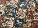 a large rug with many different designs on it