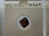 a picture of a picture of a piece of bread in a box