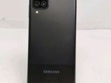 a close up of the back of a black samsung galaxy s20