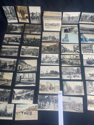 several old black and white photos of a train station and other buildings