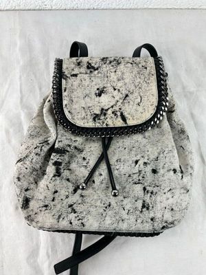 Stella Mc Cartney. sac à dos tissu, cuir et métal noir et bl…