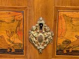 a wooden cabinet with a door handle and a painting on the door