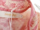 a label that says zimmerman van on a pink and white dress