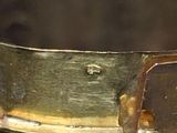 a close up of a metal object with a hole in it