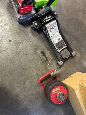 many different types of tools on the floor next to each other