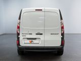 a white van that is parked in a room
