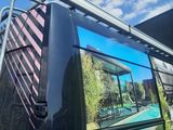 a black van with a picture on the side of it