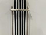 a metal rack with five umbrellas on top of it