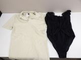 two pieces of clothing that are on a table