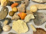 many different types of rocks and stones on the table