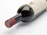 a bottle of wine that is sitting on a table