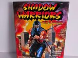 the box of the game shadow warriors is sitting on a table