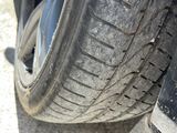 a close up of a tire on a car ' s tire