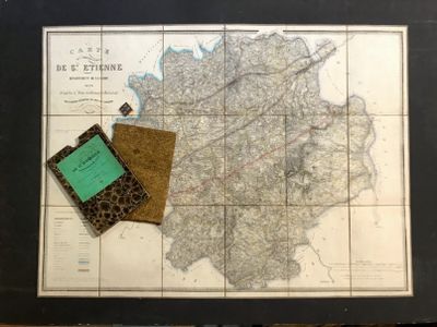 a picture of a map and a book on a table