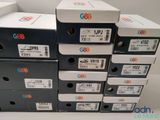 several boxes of electronic devices stacked on top of each other