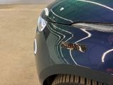 a close up of a car with a sticker on it