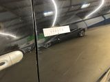 a car that has a sticker on the side of it