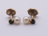 pair of pearl and black diamond stud earrings