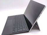 a laptop that has a keyboard on top of it