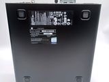 the back of a laptop with a hard drive attached to it
