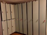 a room with a lot of lockers in it