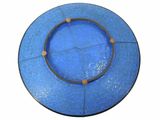 a blue plate with a circular design on it