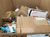 a cardboard box with a lot of items inside of it