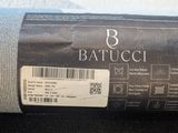 a close up of a bath towel with a barcode on it