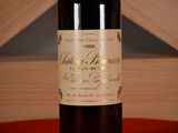 a bottle of wine that is sitting on a table