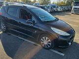 a picture of a black car parked in a parking lot