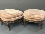a pair of antique french style foot stools with upholstered cushions