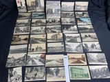a lot of old postcards that are on the table