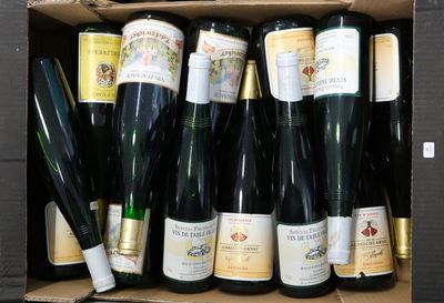 many bottles of wine in a box on the table